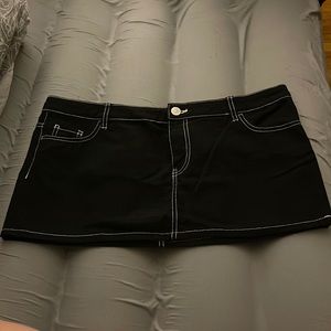 Mini black denim skirt